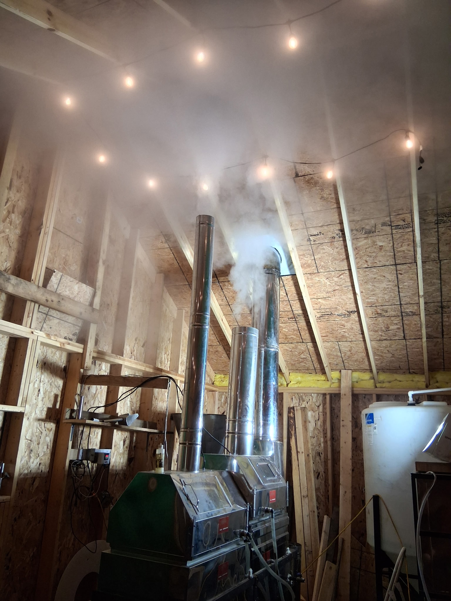 Evaporator equipment boiling maple sap inside the Minnesota Maple sugarhouse